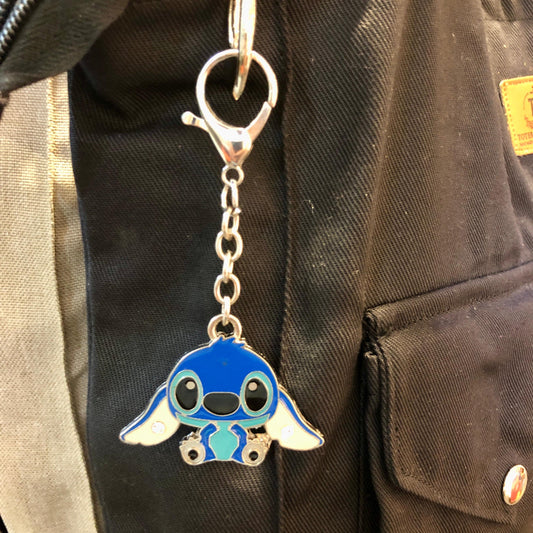 Keychain with a cartoon character attached to a bag