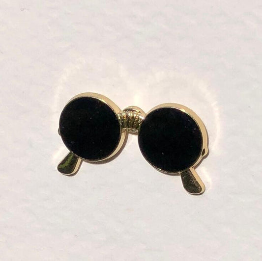 Black sunglasses-shaped object on a white background